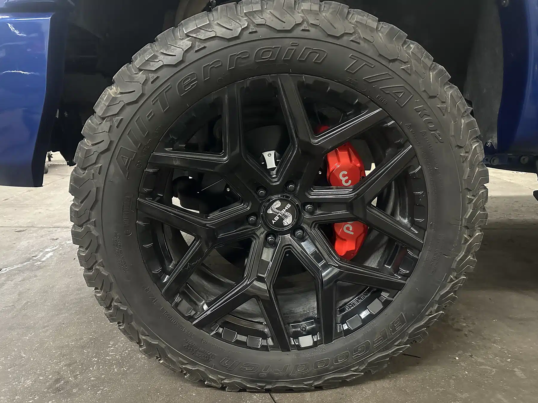 All-terrain tires for Shelby in Evoke Autowerks shop in Englewood, CO.