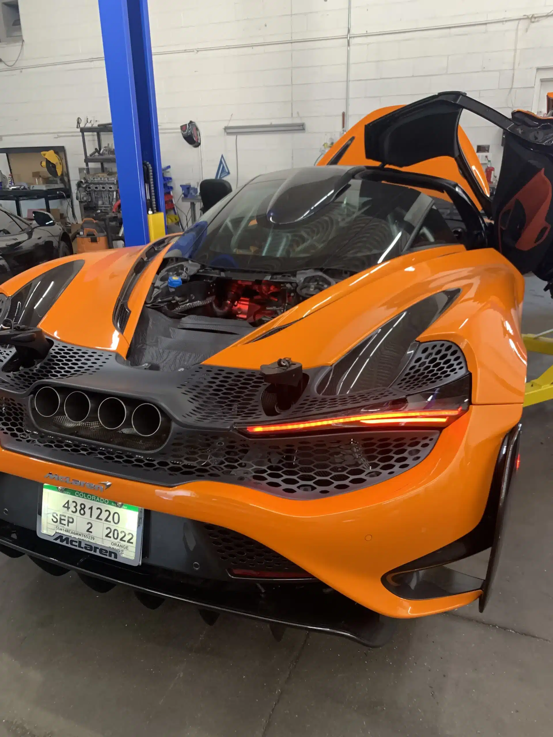 McLaren orange in Evoke Autowerks in Englewood, CO.