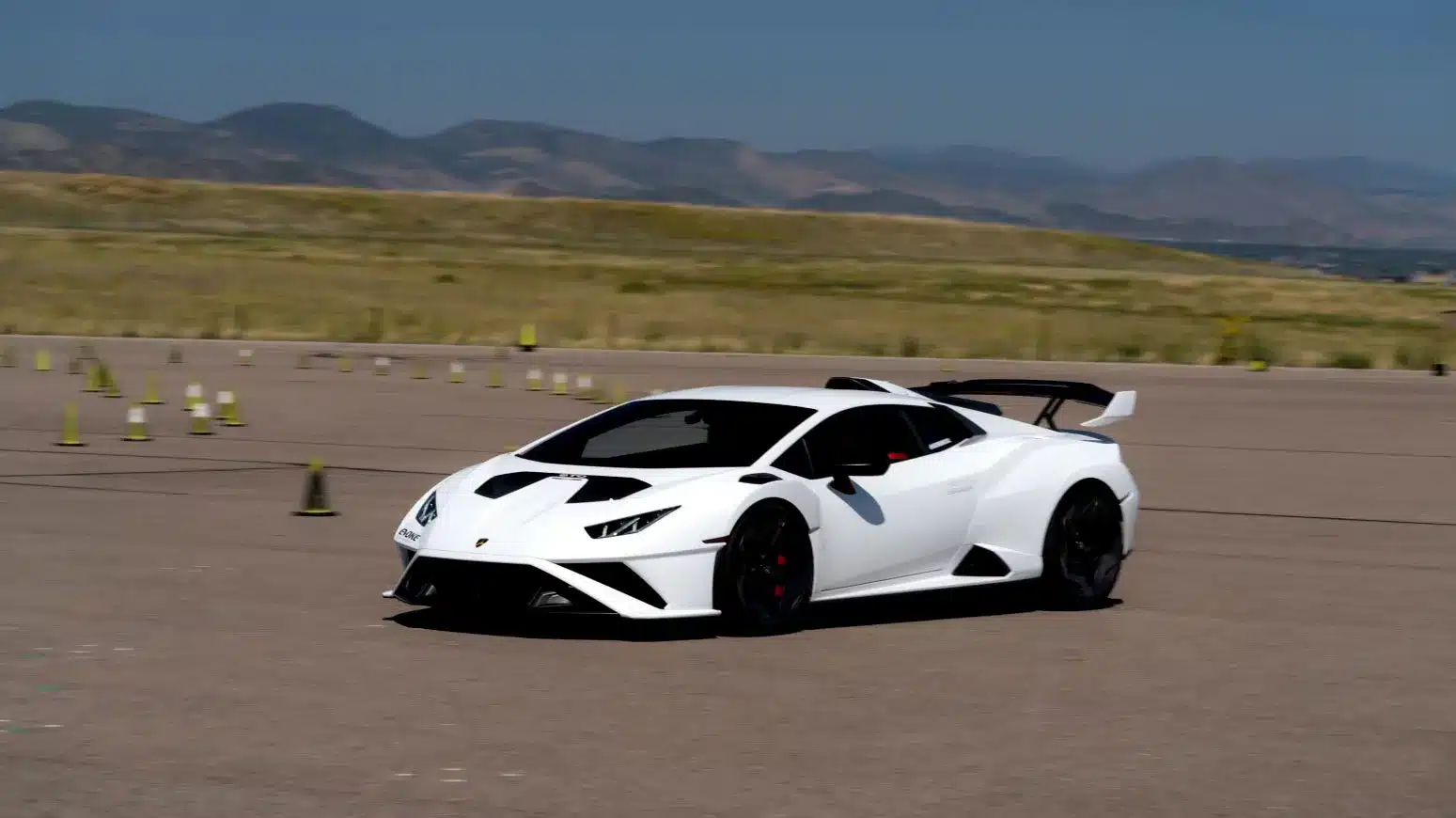 White Lamborghini aerodynamic enhancements from Evoke Autowerks.