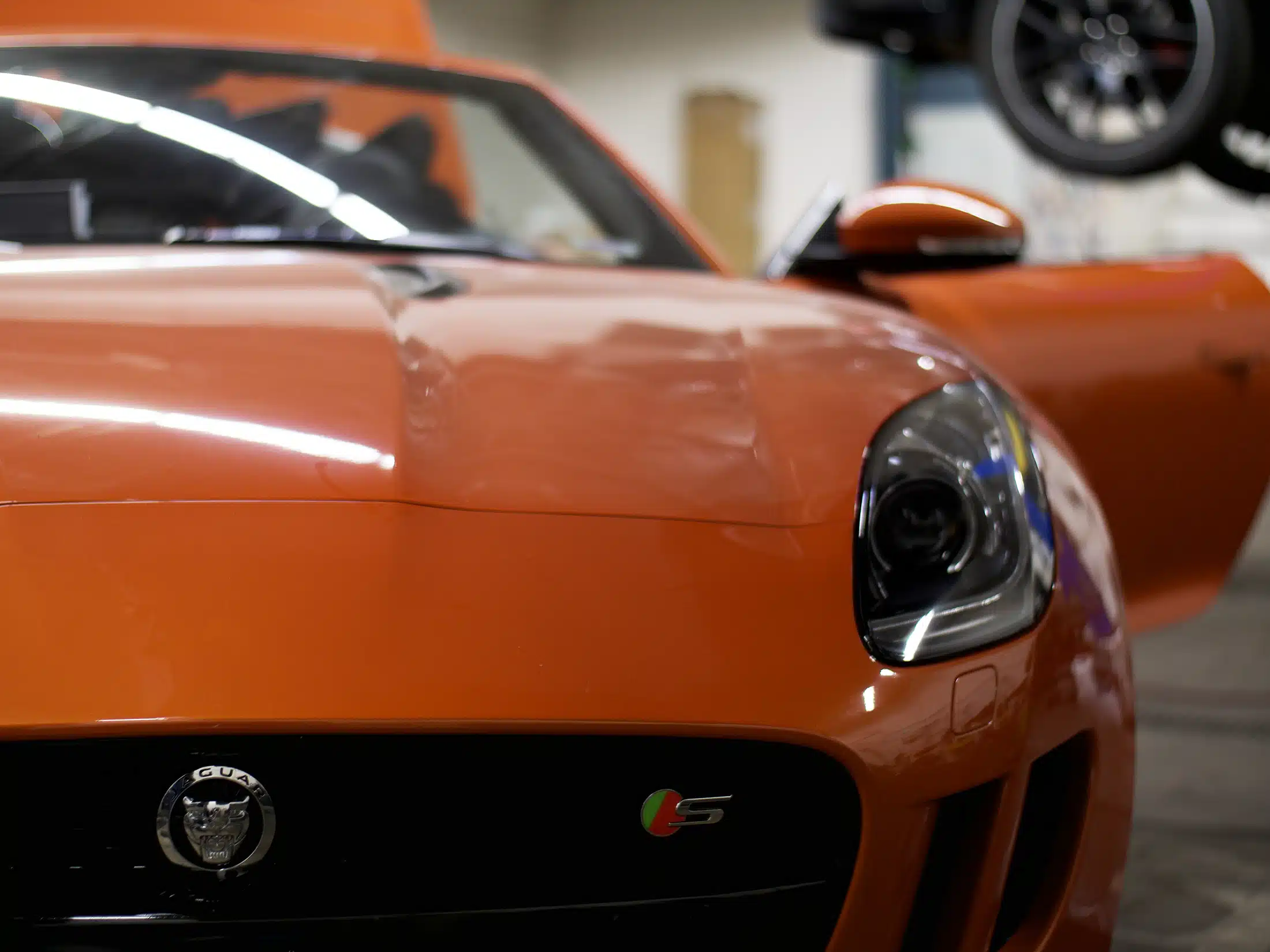 Orange Jaguar in Englewood, CO.
